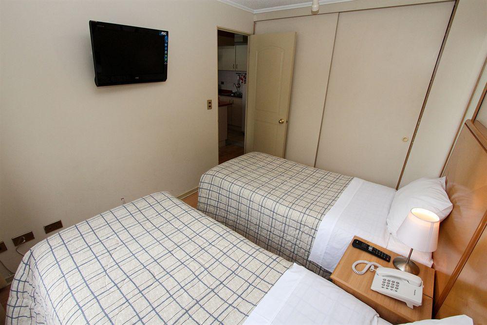 Rq Center Apartahotel