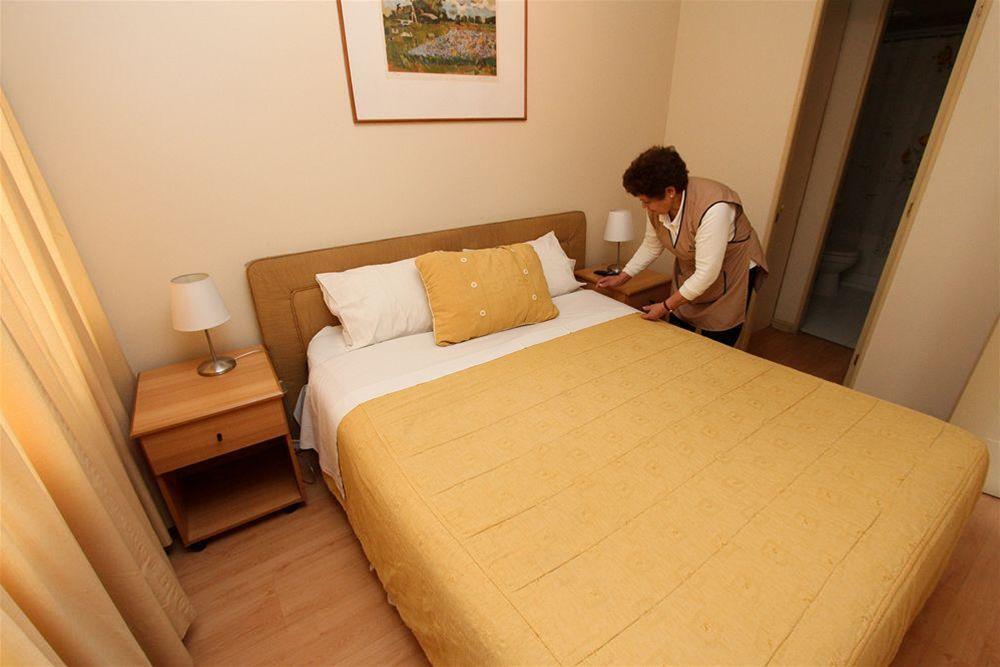 Rq Center Apartahotel