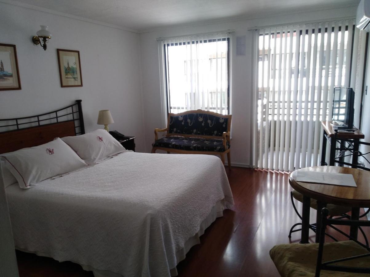 Roomapart Escuela Militar Santiago